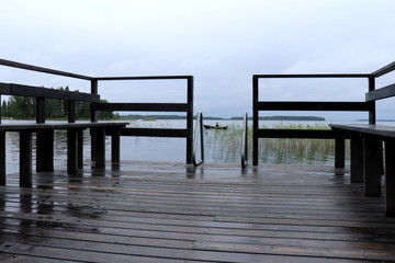 Fototapeta premium Rainy deck on Lake Saimaa, Finland