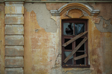Windows on the facade of an abandoned old house, Voronezh, Russia.