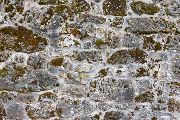 Texture of a stone wall. Old castle stone wall background. Wall made of wild stone. Natural background.