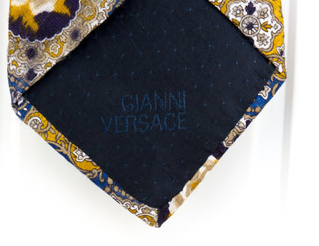 GOMEL, BELARUS - OCTOBER 25, 2019: Gianni Versace tie. Gianni Versace S.r.l. usually referred to simply as Versace, is an Italian luxury fashion company founded by Gianni Versace in 1978.