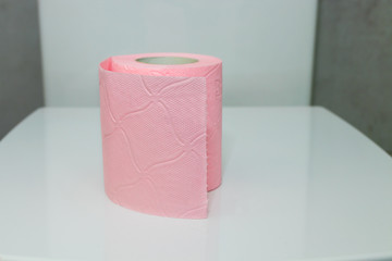 colored household toilet paper in the bathroom or toilet