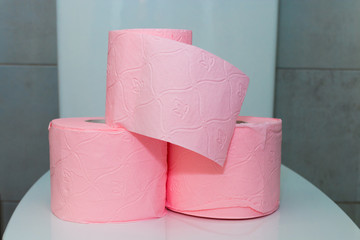 colored household toilet paper in the bathroom or toilet