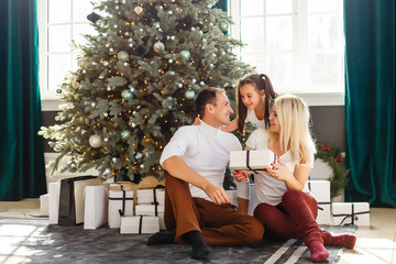happy family with christmas gift