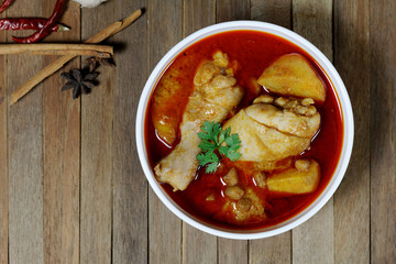 Chicken Mussaman Curry on white bowl