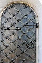 Closeup of the old door with fancy pattern