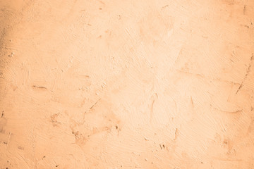Plaster. Light background. Decorative plaster. Plastered wall in sepia color. Background concept made of natural materials. Place for text.