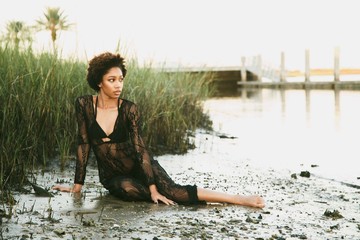 Female model at beach during sunset