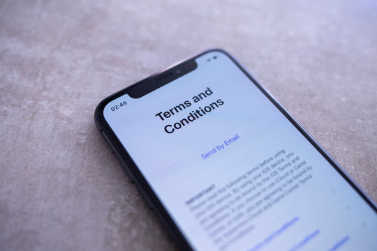 Eppelheim, Baden W&uuml;rttemberg / Germany - 04 24 2019 Apple Iphone XS Space Gray Close Up of Terms and Conditions Screen