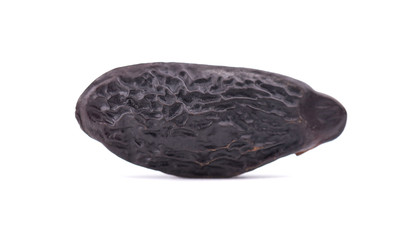 Tonka beans isolated on white background. Bean of Dipteryx odorata, cumaru or kumaru. Fresh aroma tonka beans.