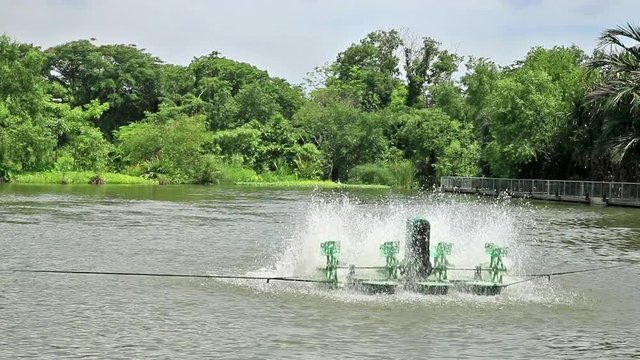 Sewage Water Spin Machine Working in Lake with zoom out technique