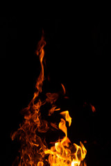 Fototapeta na wymiar hot orange fire on black background