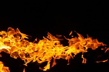 hot orange fire on black background