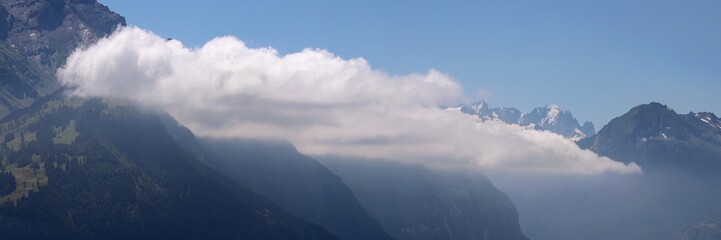 Clouds Along A Mountain Slope