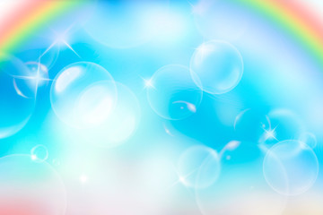 Blurred romantic background with bubbles in sky over the rainbow. Soft magic effect for Christmas, New Year and Valentines day holiday. Background for birthday party, festival. Fairy tale decoration.