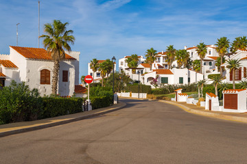 Traditional Spanish architecture with white summer villas on the island of Menorca. Spain