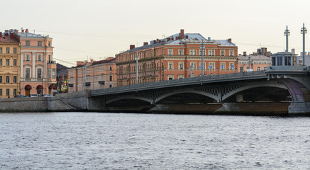 Fototapeta na wymiar Panorama of Promenade des Anglais with the Annunciation bridge. The bridge over the Neva in the city of St. Petersburg. The historical center of the city.