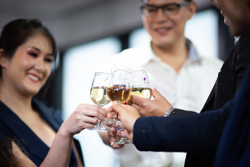 Business people drink wine At a party celebrating business success