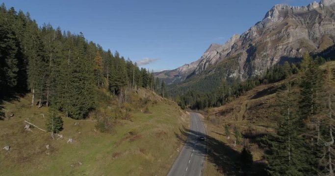 Car driving on Pillon pass - Aerial 4K