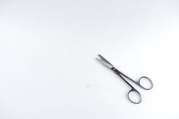 Medical scissors on a white background