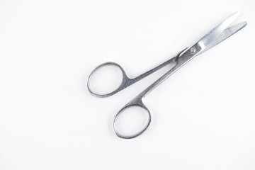 Medical scissors on a white background