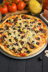 Italian pizza, with ingredients. Cookbook, homemade recipes, restaurant business. Vertical frame