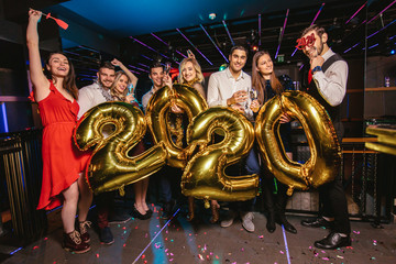 Happy Young People Dancing on New Year Party.