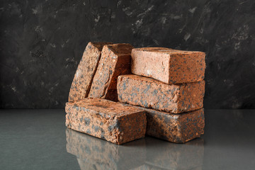 Brick. Material. Hand-made brick. Clinker. Clinker brick. Strotelye material. Construction. Production.