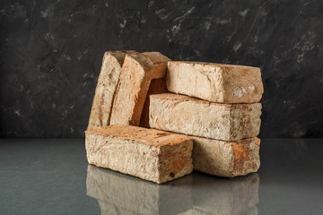 Brick. Material. Hand-made brick. Clinker. Clinker brick. Strotelye material. Construction. Production.