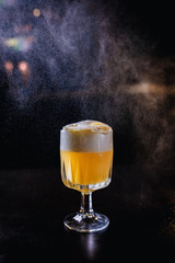yellow coctail with spray
