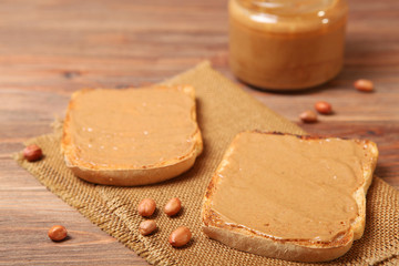 Obraz na płótnie Canvas toast with peanut butter on the table.