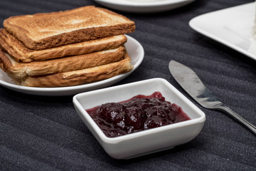 bread with jam and spread knife