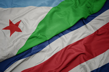 waving colorful flag of costa rica and national flag of djibouti.