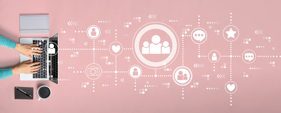 Social media theme with person using a laptop