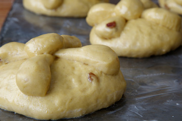 processing of puff pastry, pan de muerto, prepared in Mexico during the November celebration