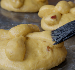 processing of puff pastry, pan de muerto, prepared in Mexico during the November celebration
