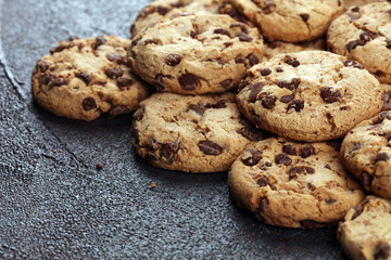 Chocolate cookies on wooden table. Chocolate chip cookies shot on table