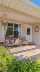 Vertical frame Front porch and garden of a traditional home