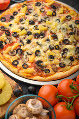 Italian pizza, with ingredients. Cookbook, homemade recipes, restaurant business. Vertical frame