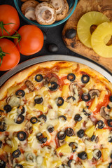 Italian pizza, with ingredients. Cookbook, homemade recipes, restaurant business. Vertical frame