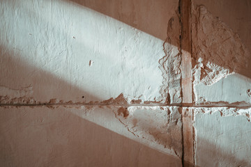 Concrete wall with seam lines in light colored tones
