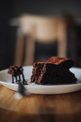 Slice of vegan chocolate brownie cake