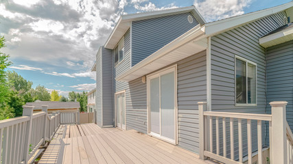 Fototapeta premium Panorama Modern two storey home with unfinished deck area