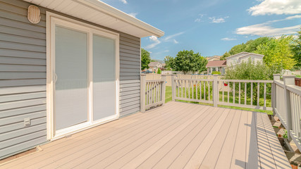 Panorama Modern outdoor home deck area on sunny, clear day