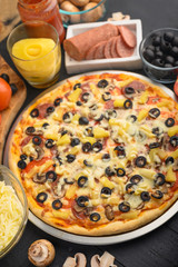 Italian pizza, with ingredients. Cookbook, homemade recipes, restaurant business. Vertical frame