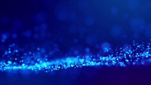 glitter blue magic particles fly and glow in viscous liquid with amazing bokeh for fantastic background in 4k. Close-up shot with luma matte as alpha channel to cut out particles. 3d render