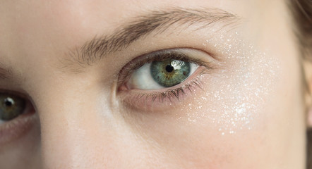 Blonde woman with green eyes