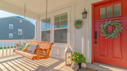 Panorama frame Front porch of alternative home and swinging chair