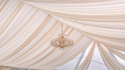 Panorama frame Stunning wedding venue with white canopy and curtains under the glass roof