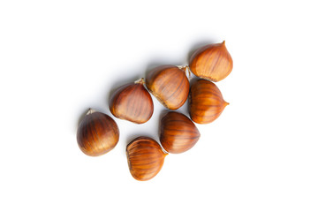 The group of sweet chestnuts isolated on a white background