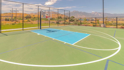 Panorama frame Outdoor green basketball court three point line